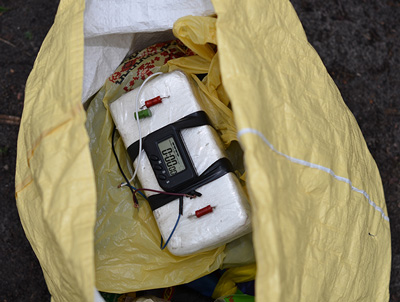 A bomb inside a yellow plastic bag