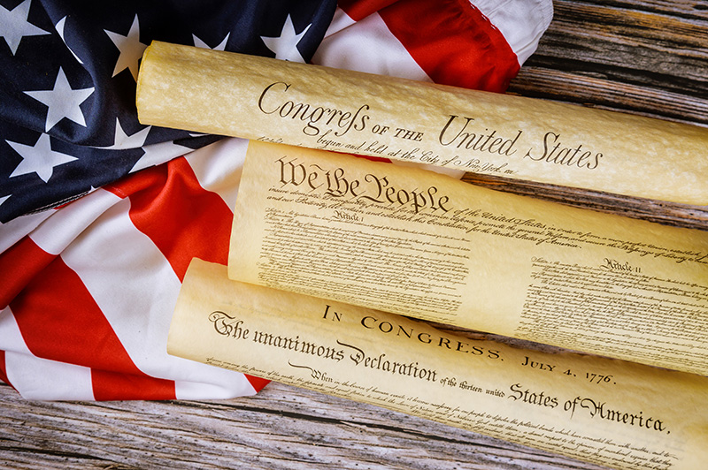 Images of U.S. historical documents, including the Declaration of Independence