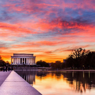 The national mall in Washington, DC, before a colorful sunset